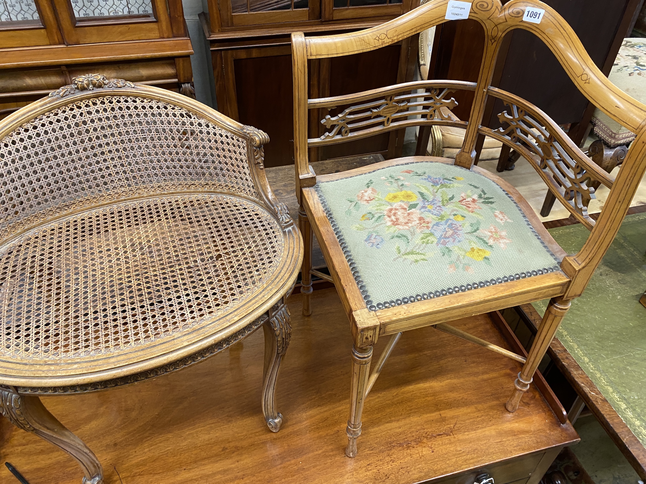 A French oval caned walnut oval seat chair and an inlaid satinwood corner chair